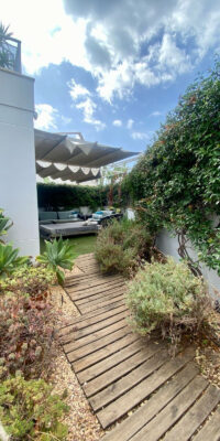 Apartamento en planta baja con oasis de jardín privado Apartamento en planta baja con oasis de jardín privado