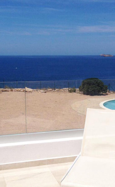 Beautifully Renovated Seafront Townhouse with Sunset Views
